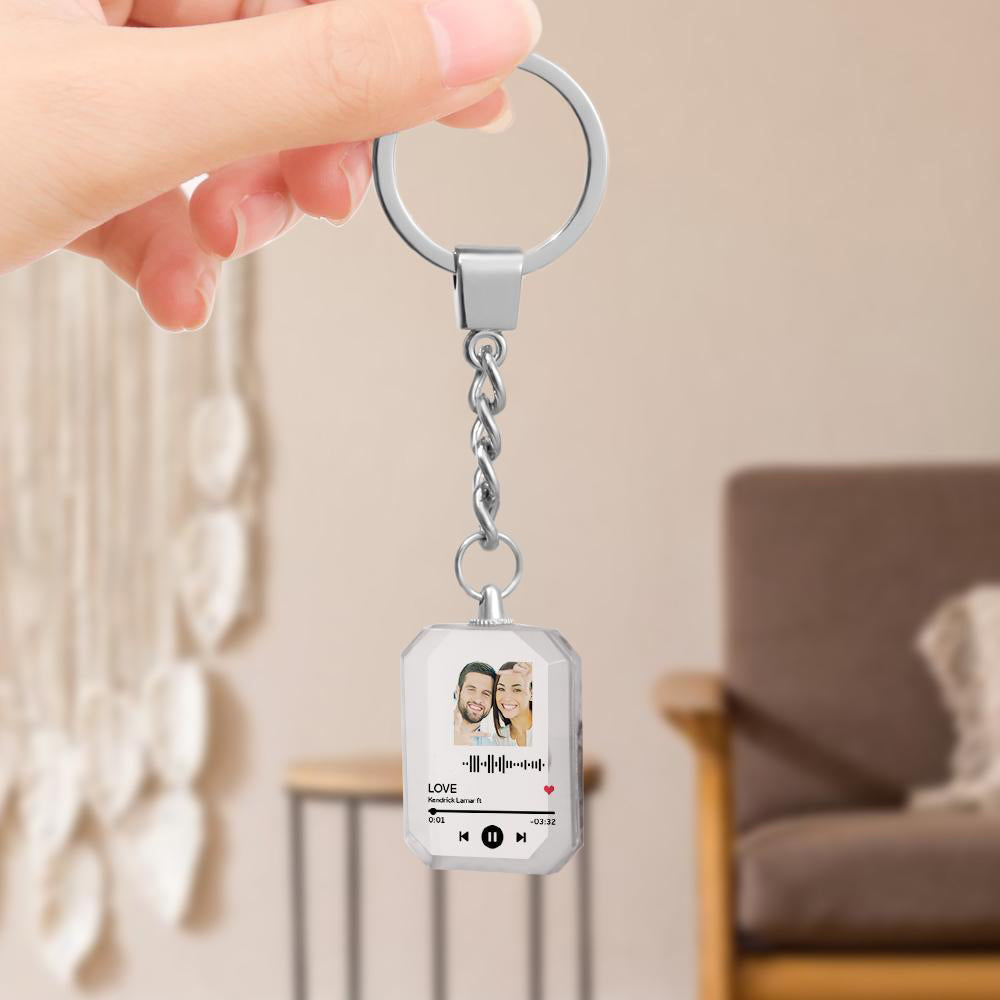 Personalized crystal keychain with photo and scannable code, perfect gift.
