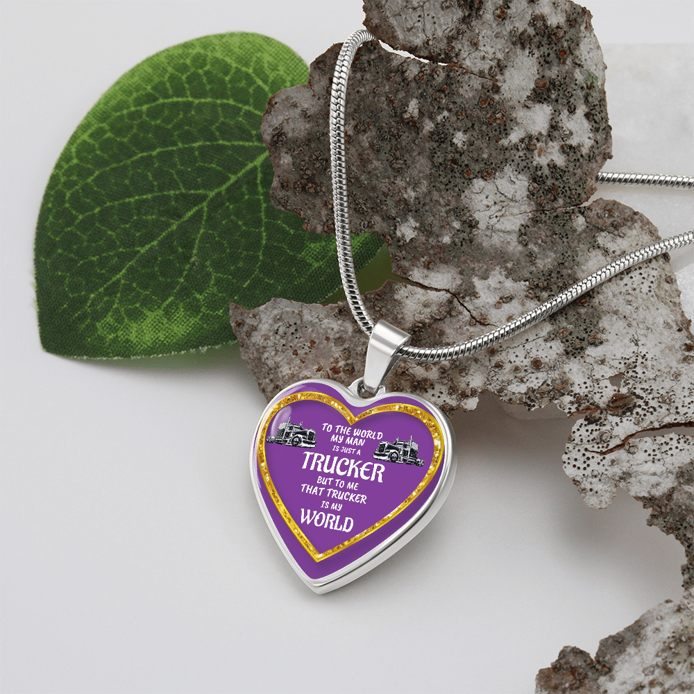 Heart-shaped necklace with a truck driver message and silver chain.