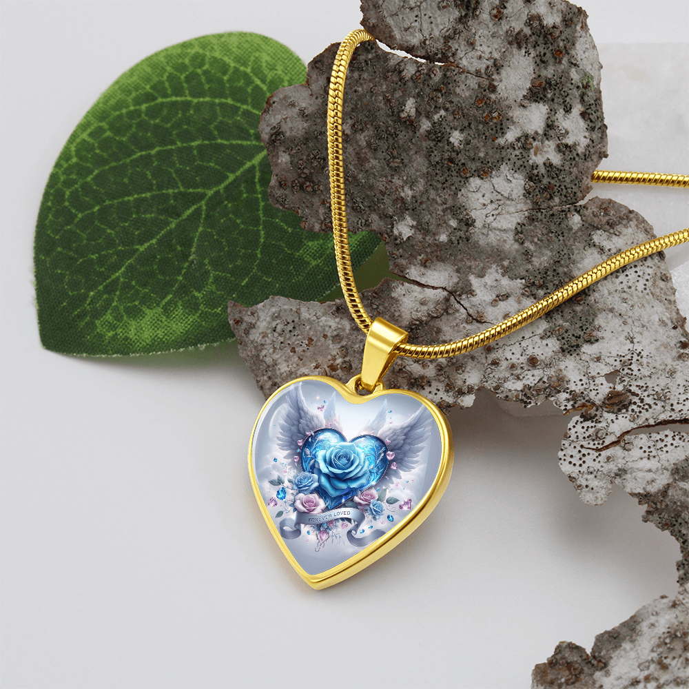 Gold heart pendant necklace with blue rose and angel wings design on a gold chain.