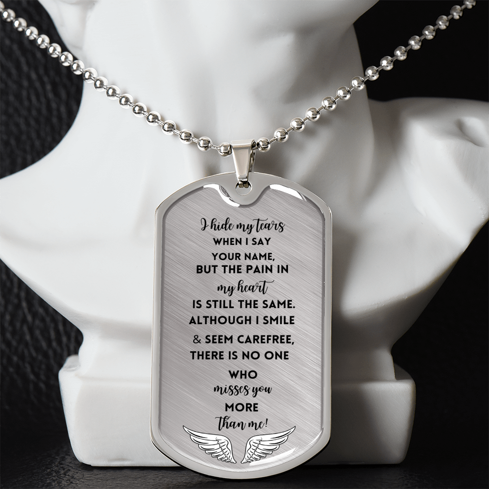 Silver military dog tag necklace with engraved heartfelt memorial message and wing design on ball chain.