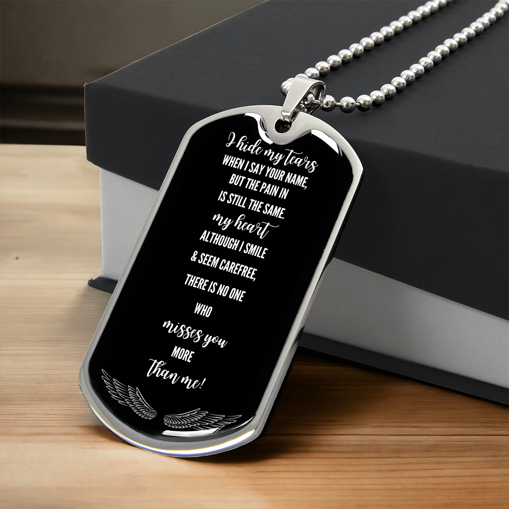 Black military dog tag necklace with silver edges and ball chain, engraved sentimental poem about loss and remembrance.