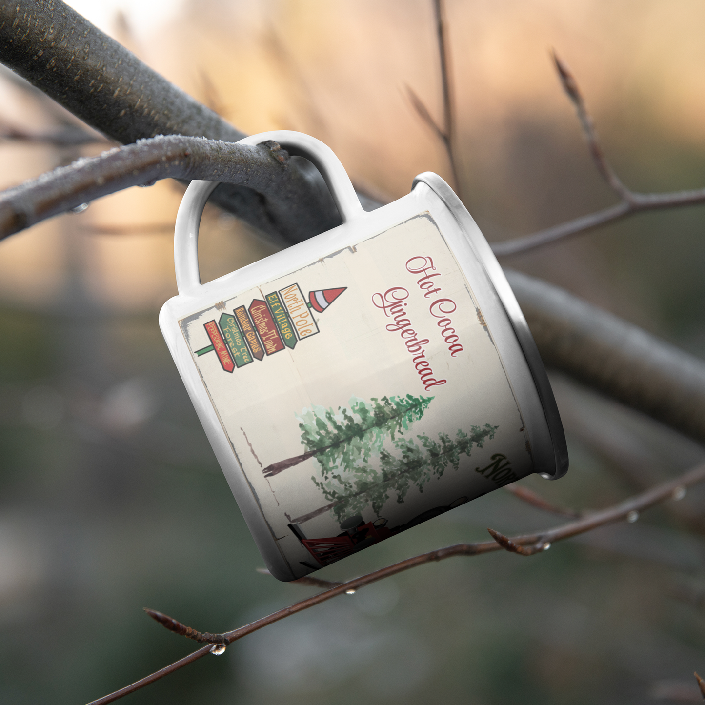 Christmas_Enamel_Mug_North_Pole_Express__CampingMugLifestyleHanginBranch_Mockup.png
