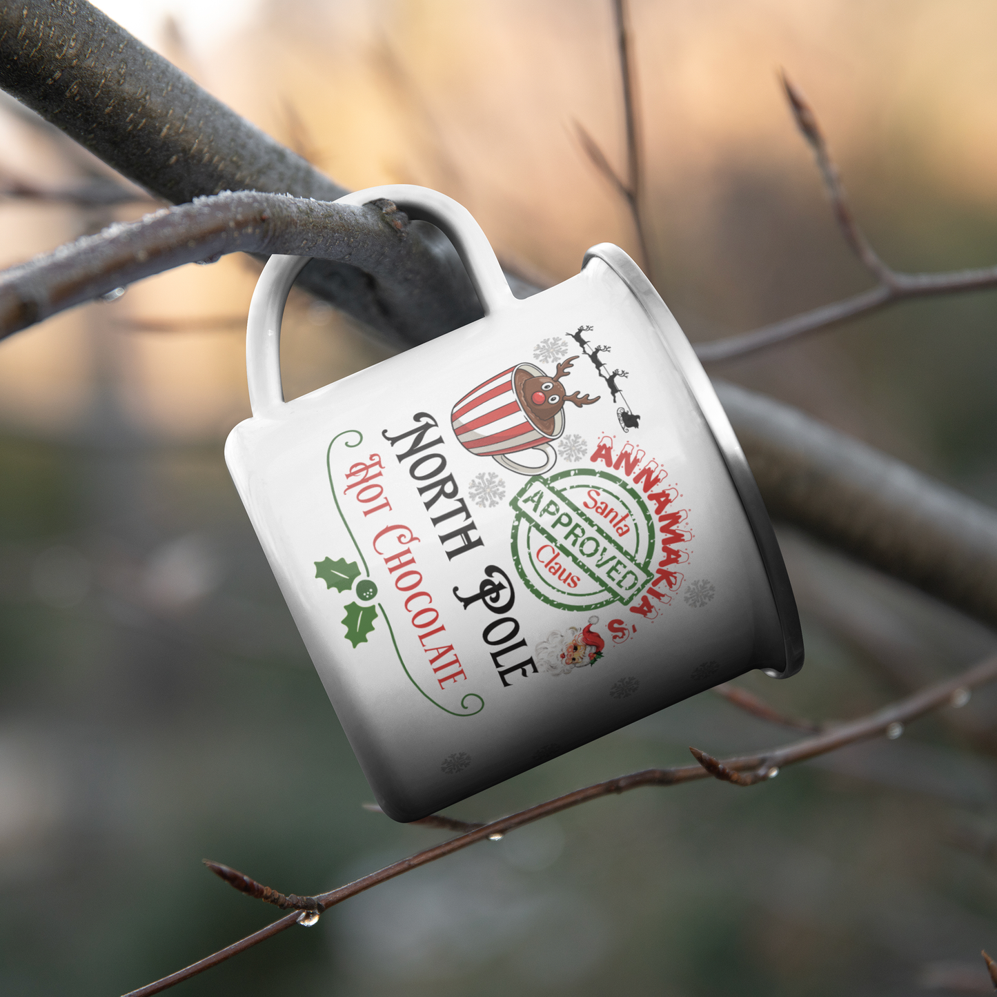 Christmas_North_Pole_Hot_Chocolate_perso_CampingMugLifestyleHanginBranch_Mockup.png