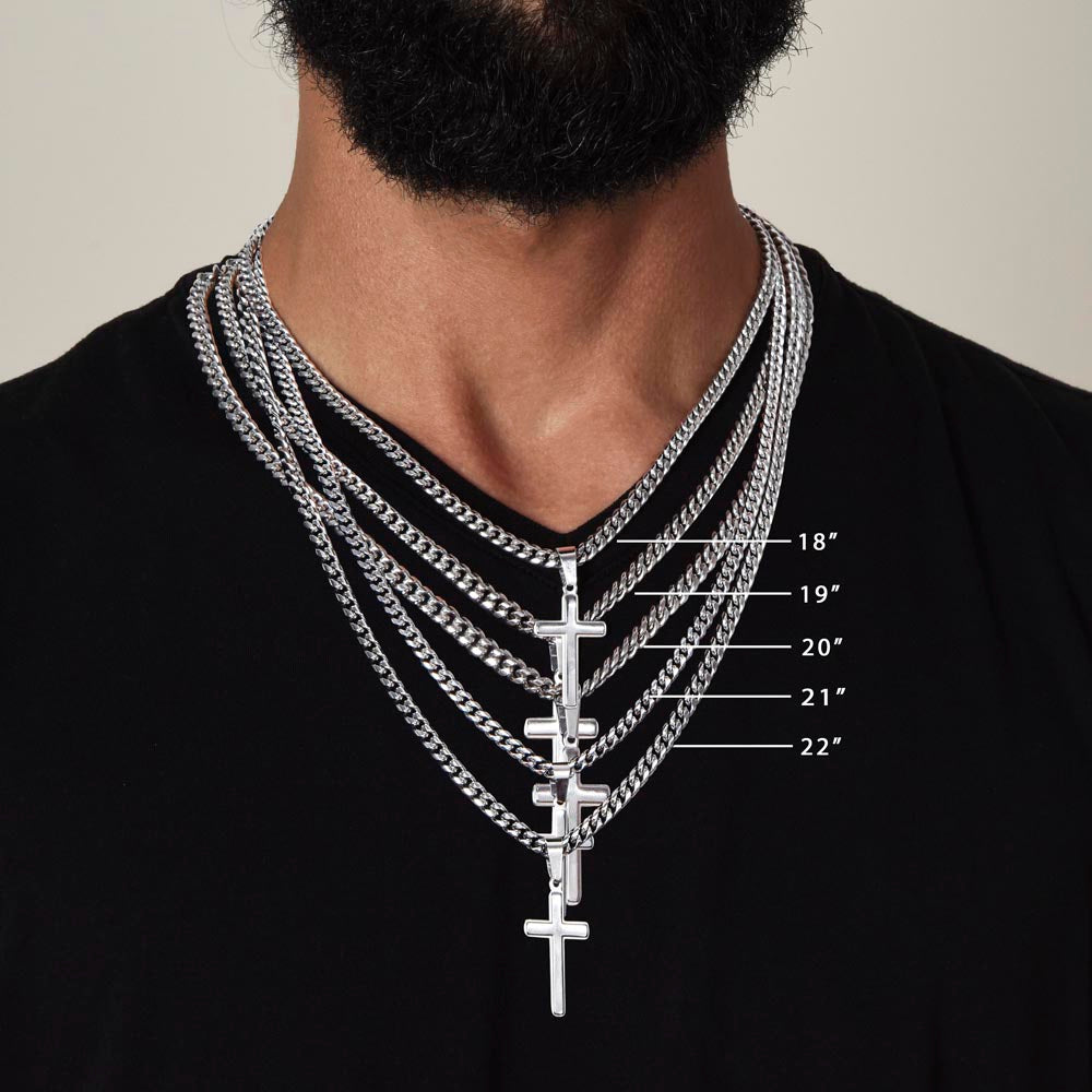 Silver artisan cross necklace on multiple Cuban chains showcasing various lengths from 18 to 22 inches, worn on a person with a black shirt and beard, demonstrating the adjustable feature and elegant design of the product.