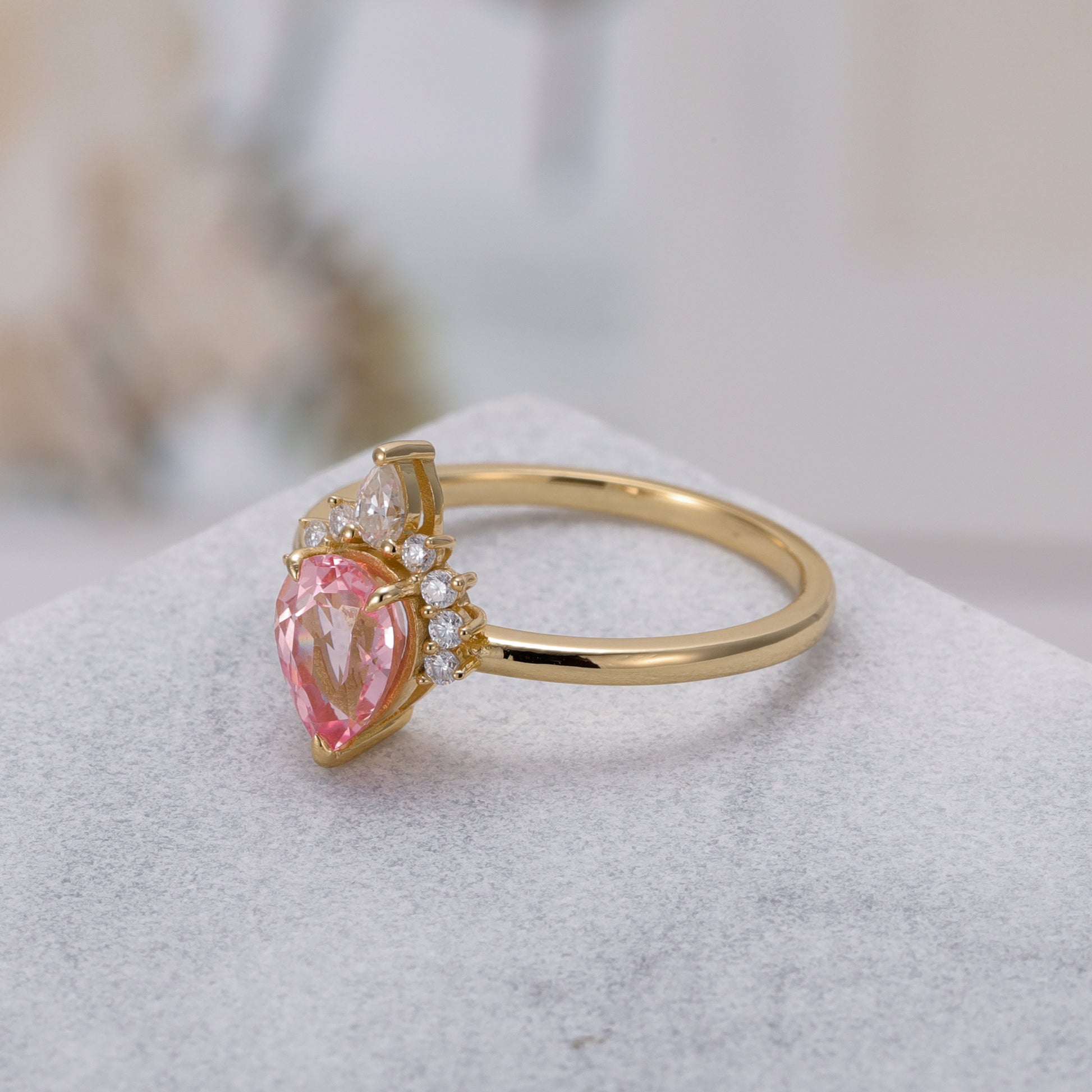 925 Sterling Silver Lab Pink Sapphire Ring with pear-shaped pink sapphire and gold plated band design.