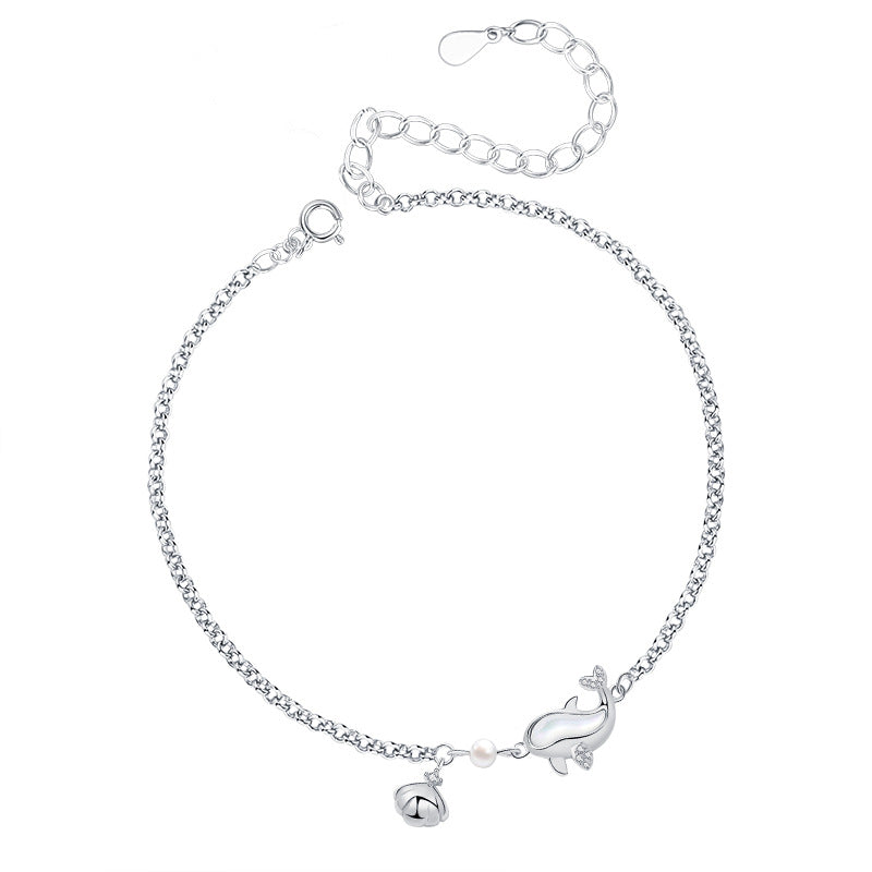 Elegant 925 sterling silver dolphin bracelet with delicate chain, adjustable length, and charming dolphin-shaped pendant, perfect for ocean lovers and fashion-forward individuals seeking a touch of marine-inspired elegance.