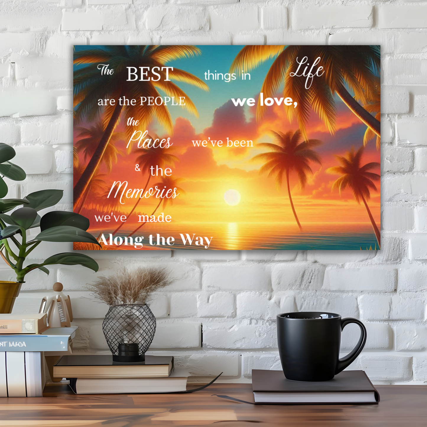 Decorative wall art with sunset and palm trees on a white brick wall, featuring motivational text.